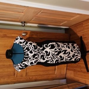 Slimming black/white wiggle cocktail dress